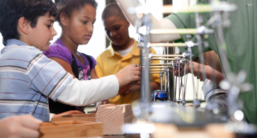 Students building bridges for a science project.